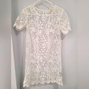 Rebellion lace dress with embroidery. Size small.